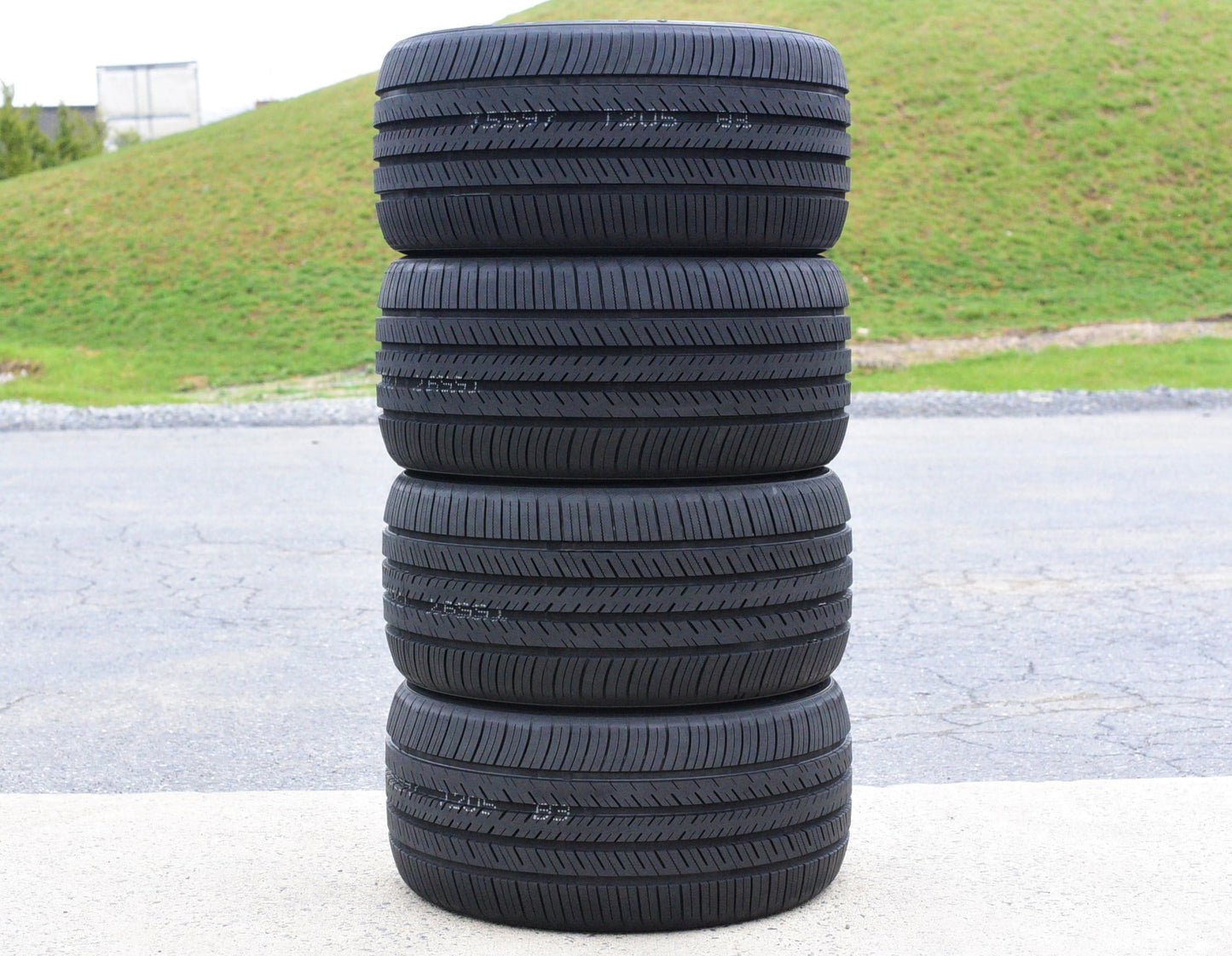 A pair of 2 (2) 255/40R20 101W XL A/S performance tires